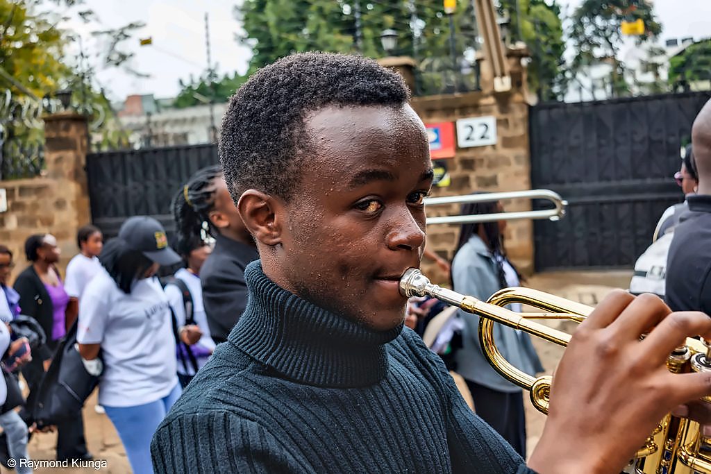 A brass band accompanying the community walk