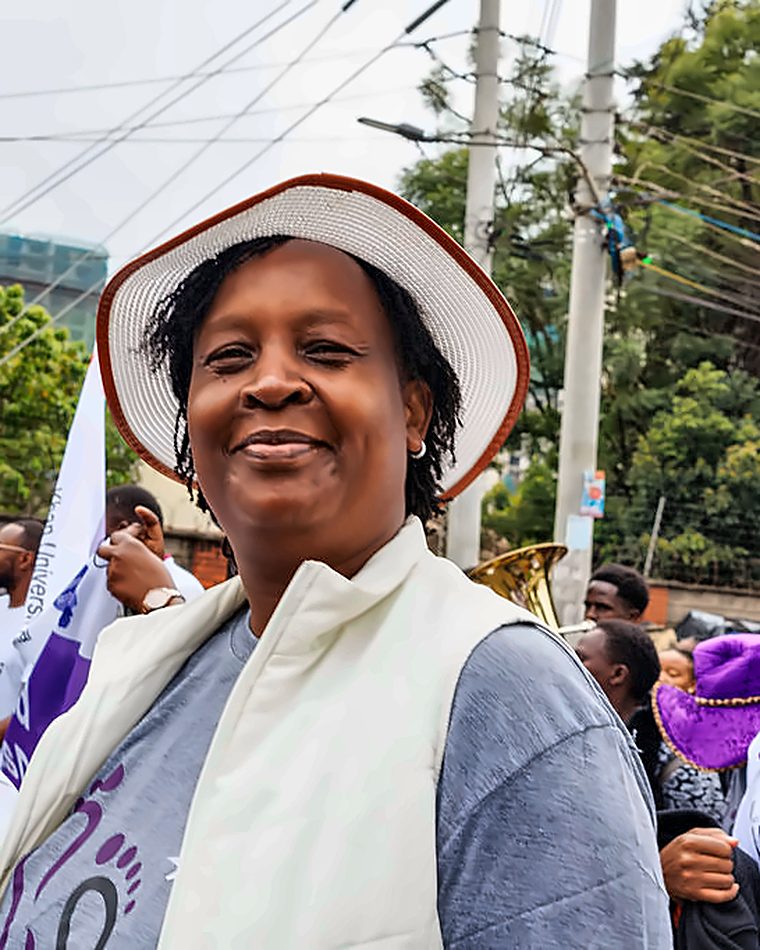 An LFA member smiling during the World Lupus Day community walk in Nairobi