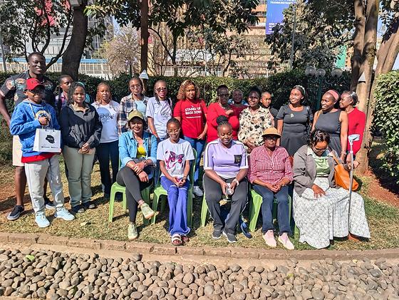 The LFA community together for a group photograph in a garden